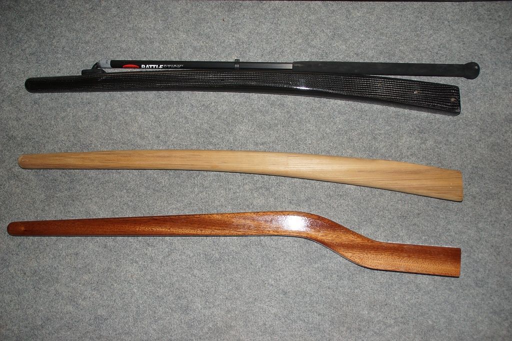 Surprise : barre au choix en bois vernis - Teck ou carbone