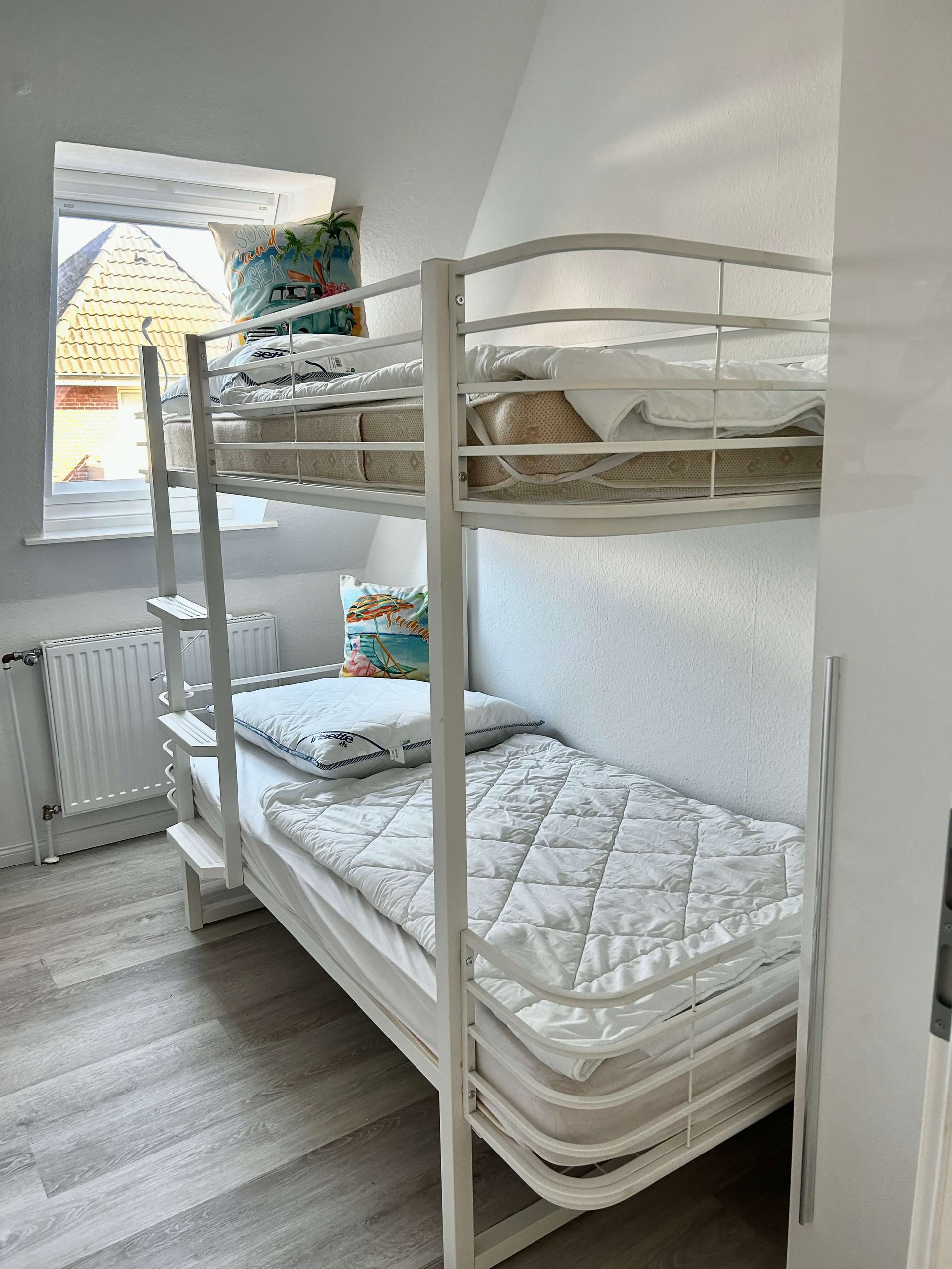Ferienwohnung Türkis im Haus Aquamarin in Büsum – Zweites Schlafzimmer mit Etagenbett