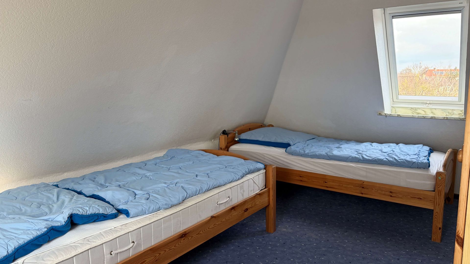 Ferienwohnung Topas im Haus Aquamarin in Büsum – Zweites Schlafzimmer mit dritten Einzelbett