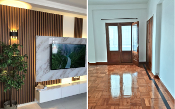 Cozinha moderna branca com armários brilhantes, piso de mármore e eletrodomésticos de aço inoxidável.