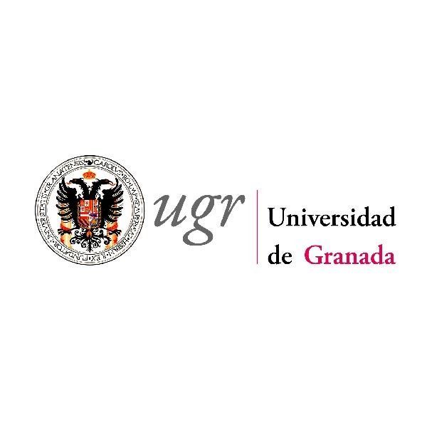 Un logotipo para la Universidad de Granada con un águila.