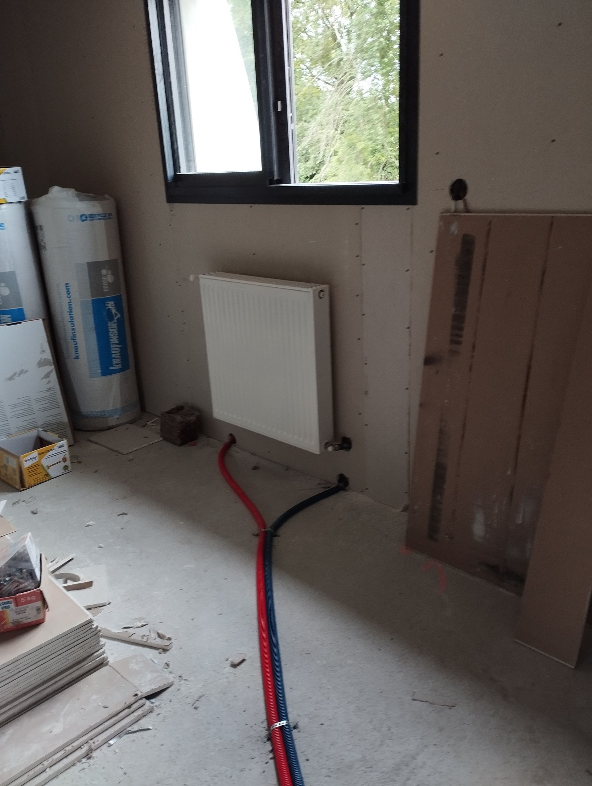 Installation d'un radiateur.