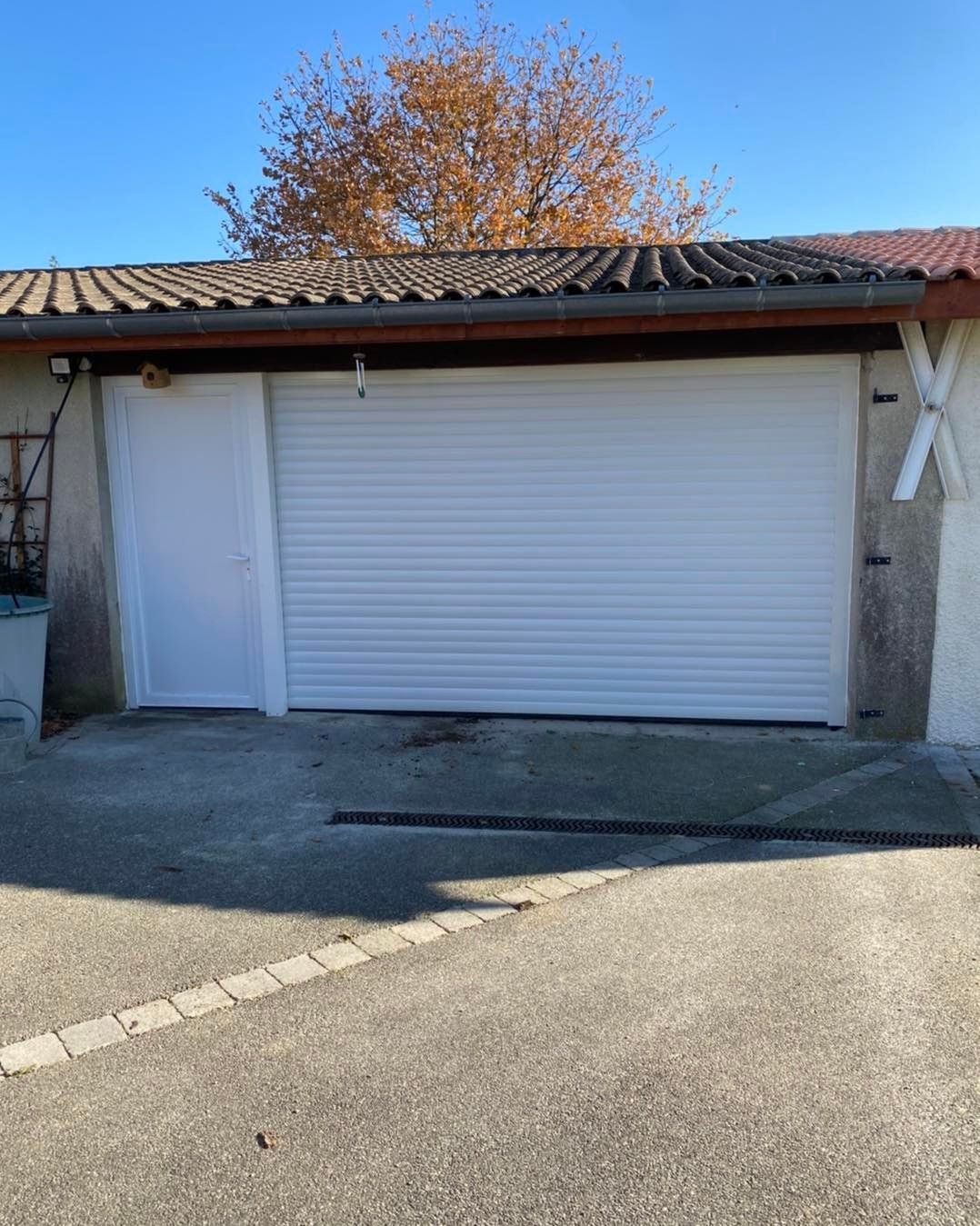 Porte et volet roulant de garage