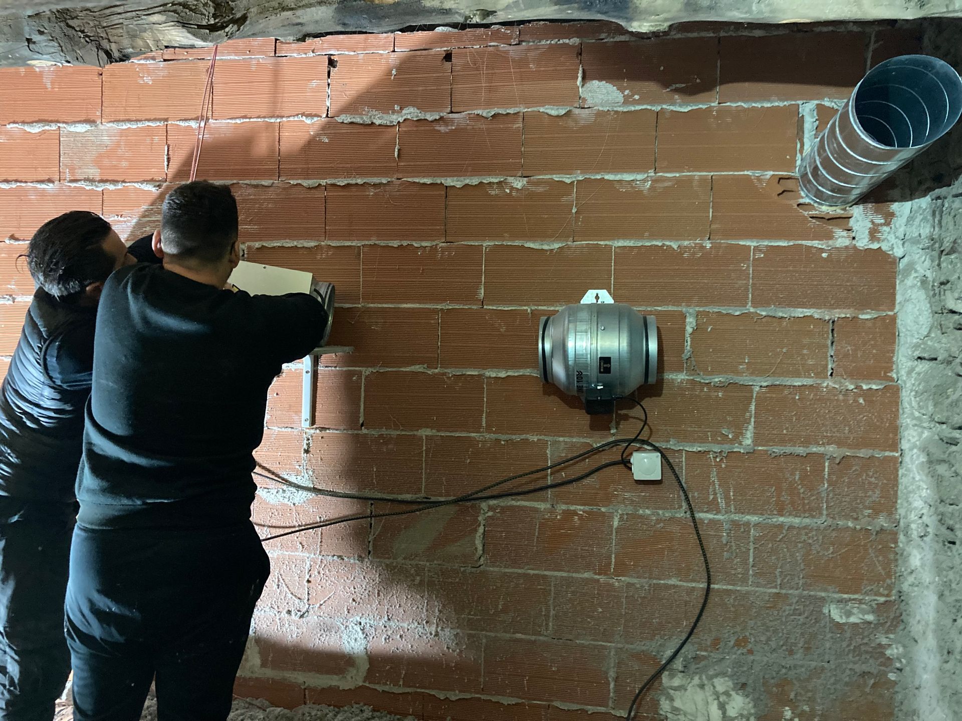 Traitement du radon sur un mur maçonné