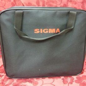 Una bolsa negra con la palabra sigma en ella
