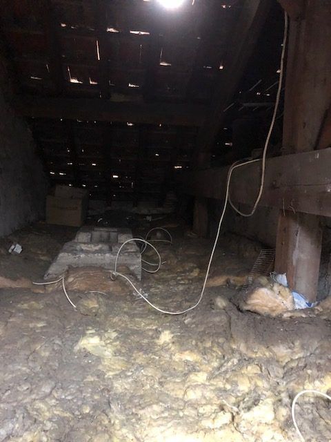 Combles avec ancienne laine de verre