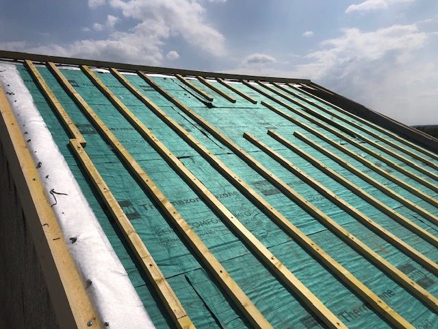 Pose des éléments structurants de la toiture