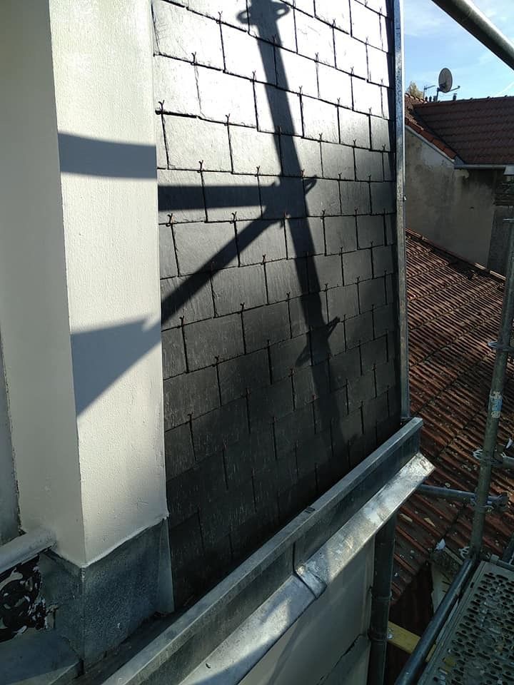 Réfection des ardoises sur les murs