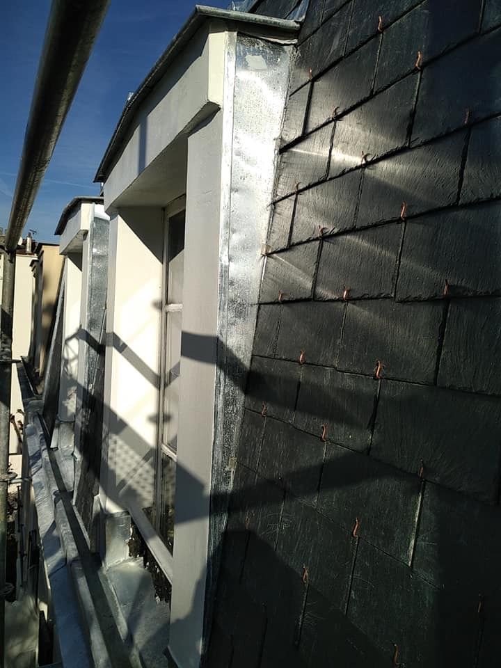 Réfection de la protection des murs en ardoises