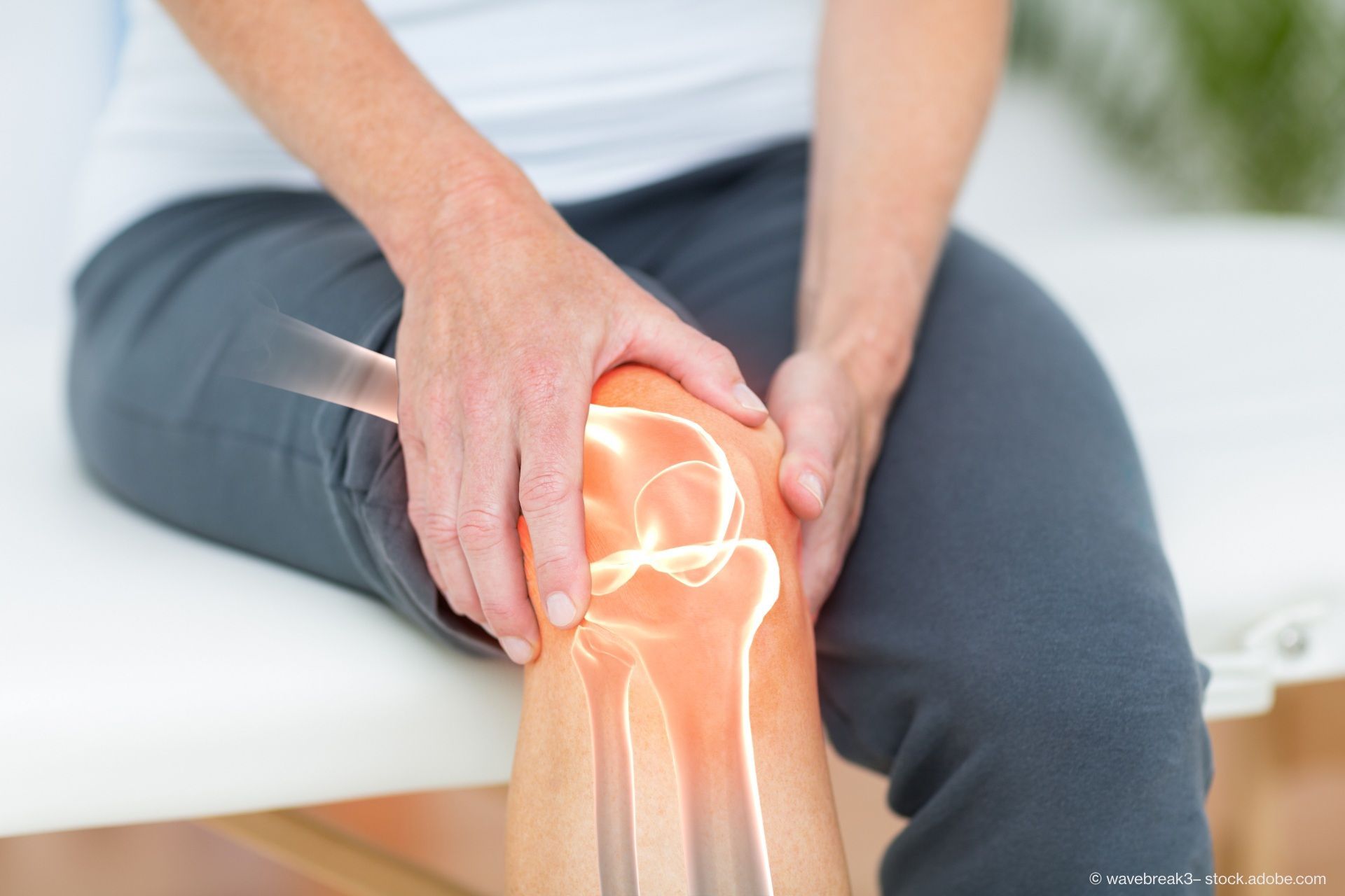 Grafik einer Person mit schmerzendem Knie