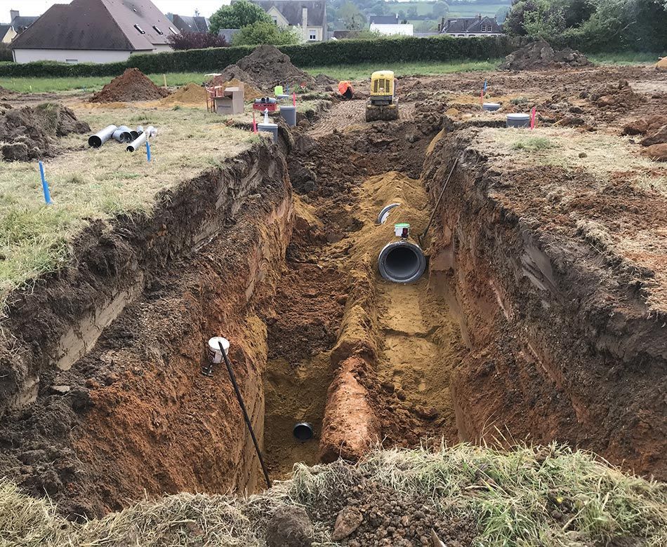Tranchée d'un réseau d'assainissement collectif