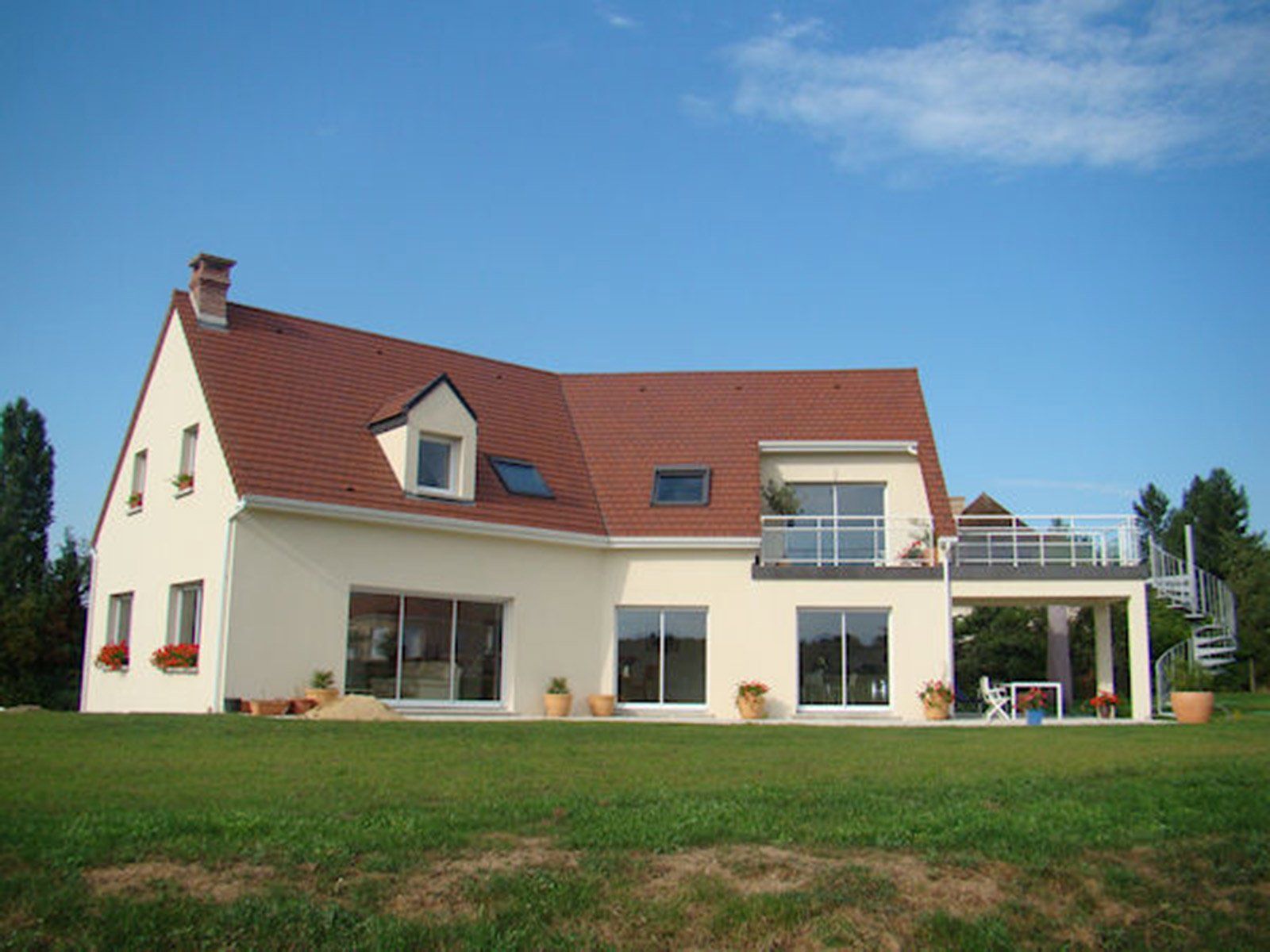 Maison grandes baies vitrées