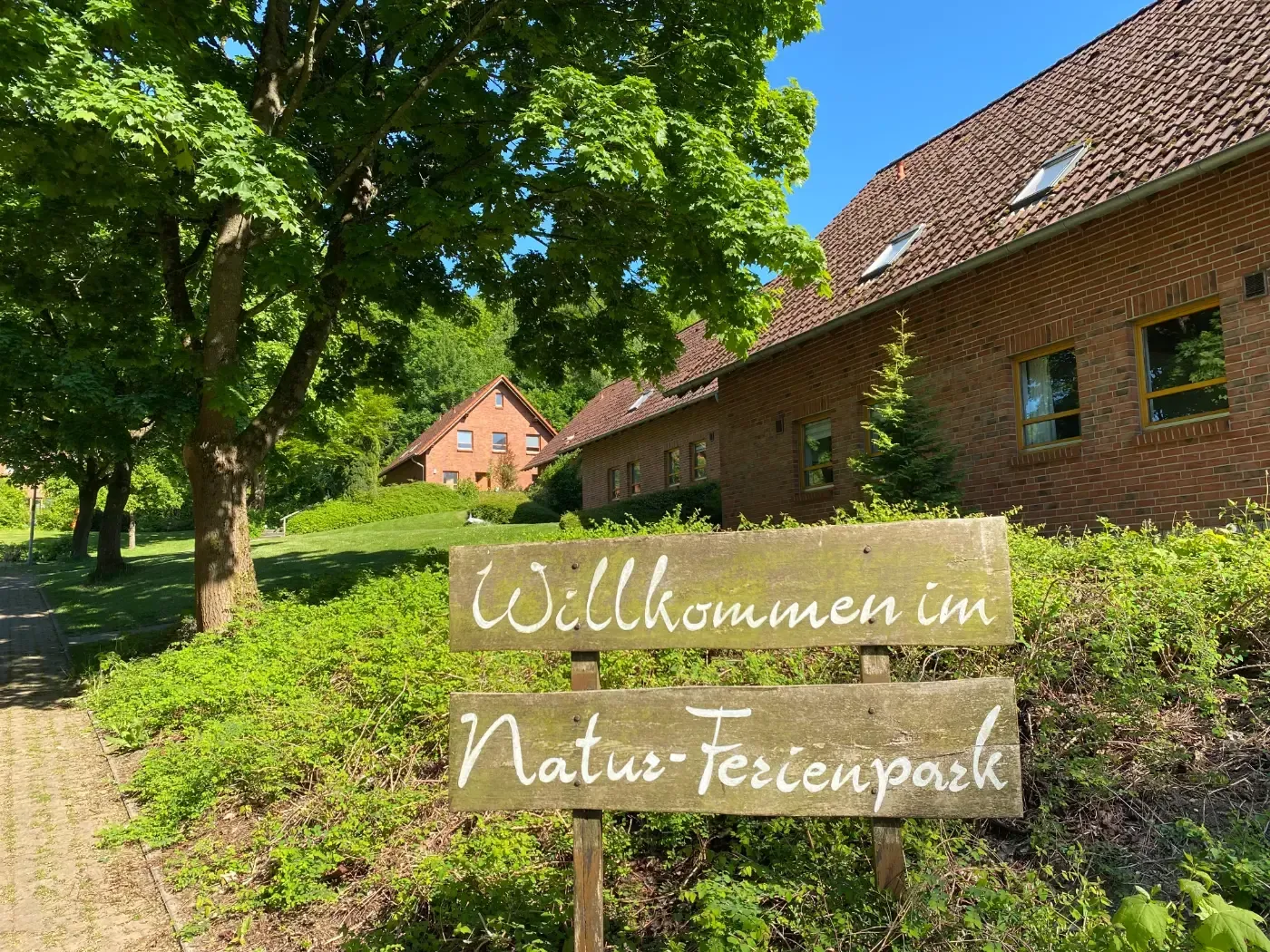 A wooden sign reading 