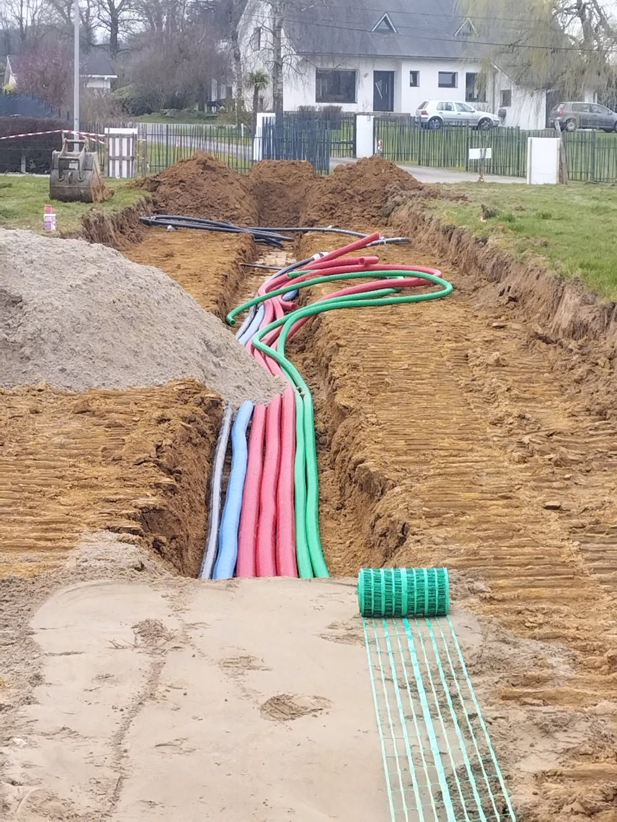 Mise en place de tuyaux sous terre