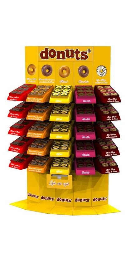 Una exhibición de donas con muchos sabores diferentes.