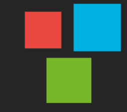 Tres cuadrados de colores superpuestos sobre un fondo oscuro: rojo, azul y verde.