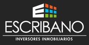 Logotipo de Escribano Inversores Inmobiliarios que presenta una letra E estilizada junto a una cuadrícula de cuadrados naranjas, azules y verdes.
