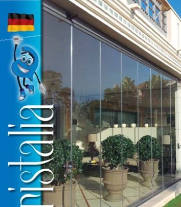Un edificio con un cartel azul que dice Nistalia
