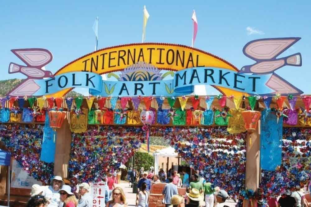 Folk art market in Santa Fe sign