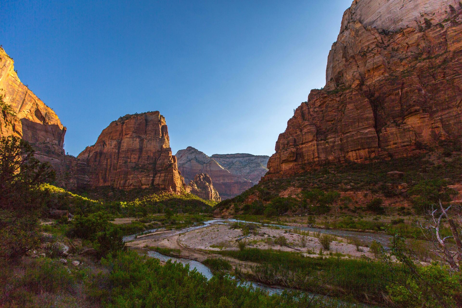 summer sunset views behind big rock formations