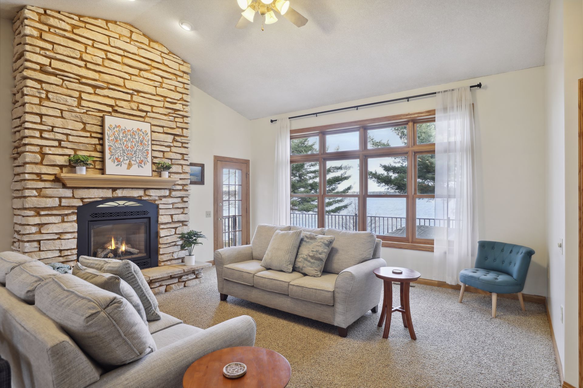 A living room with a fireplace and a couch
