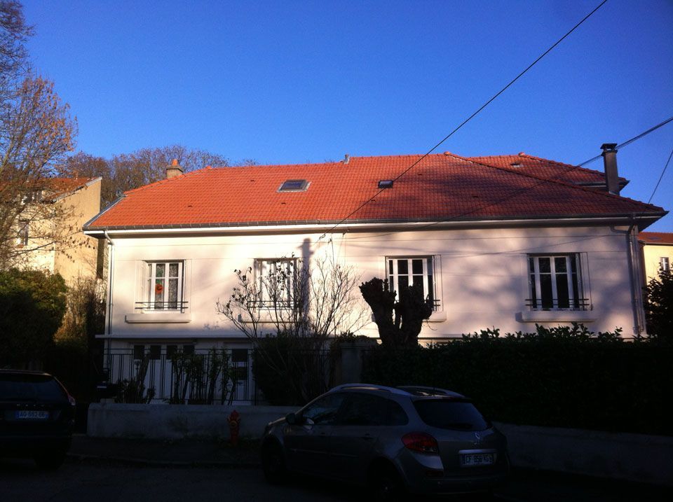 Maison avec une couverture entièrement faite par Nancy Toiture