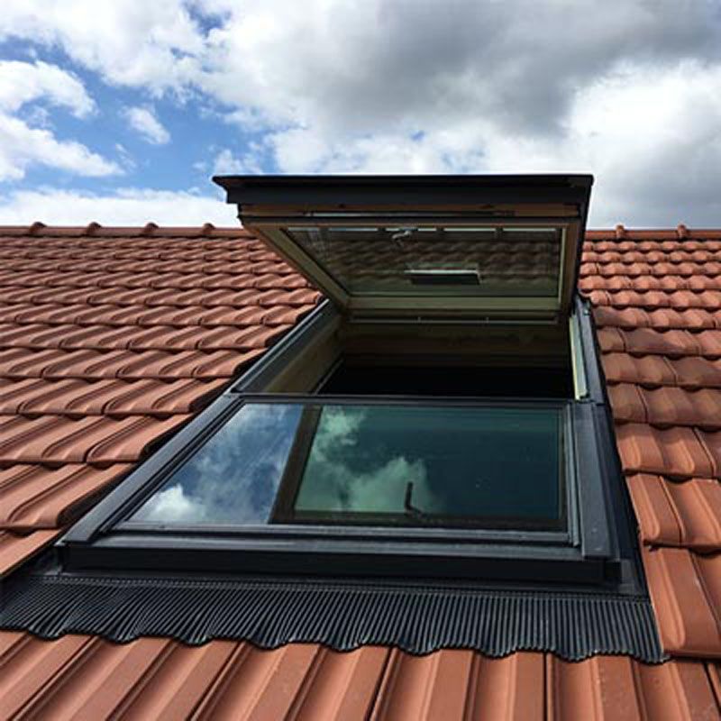 Fenêtre de toit Velux sur un toit classique