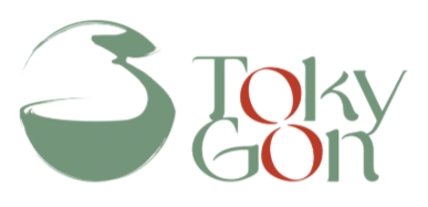 Logo für TokyGon: stilisierter grüner und roter Text neben einer grünen abstrakten Form.