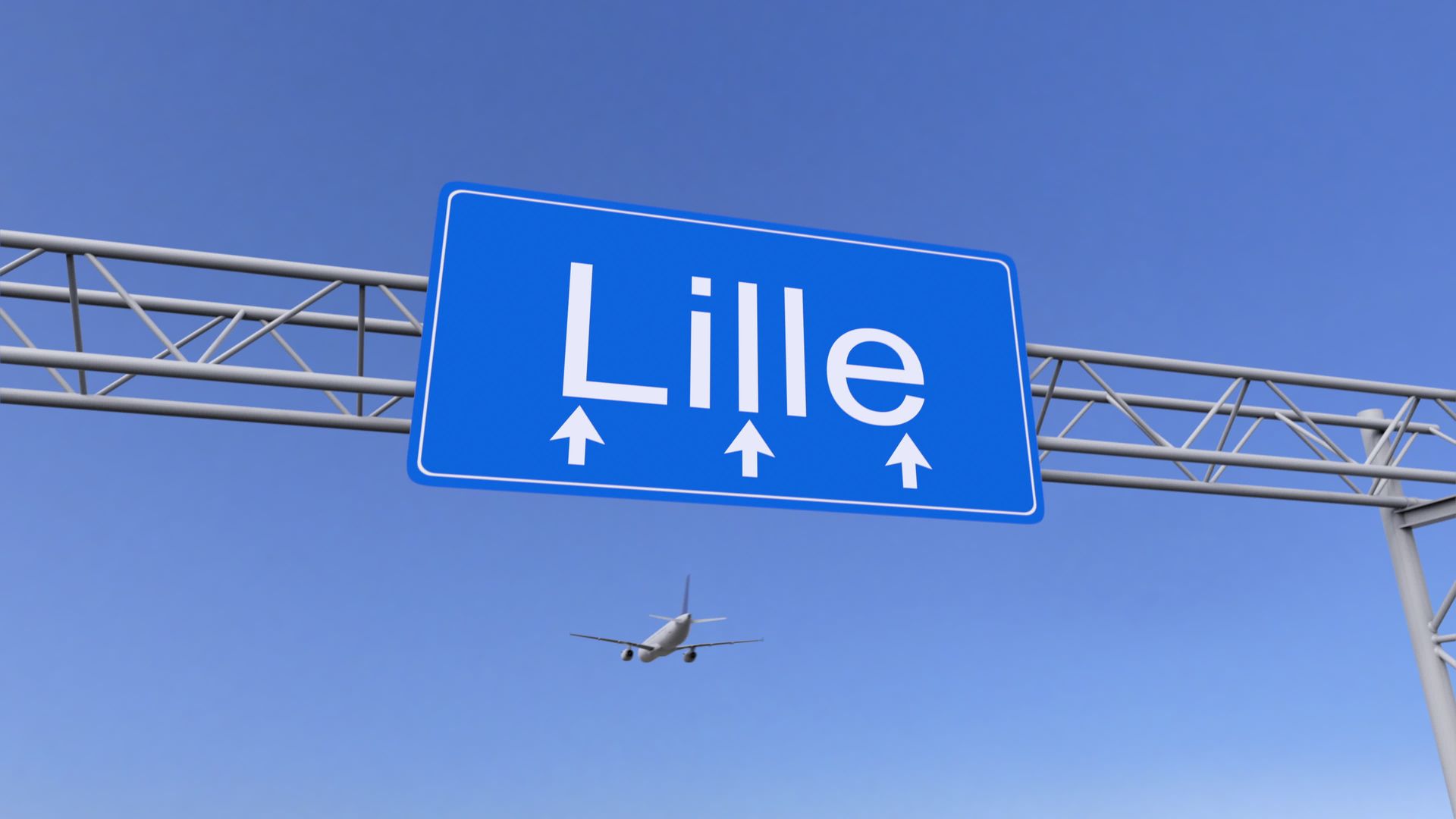 Un panneau routier bleu portant l'inscription Lille avec des flèches et ciel dégagé avec un avion.