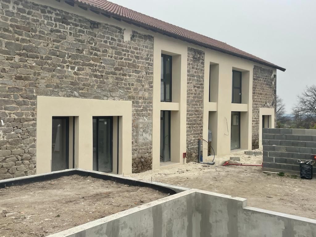 Chantier habillage façade en pierre
