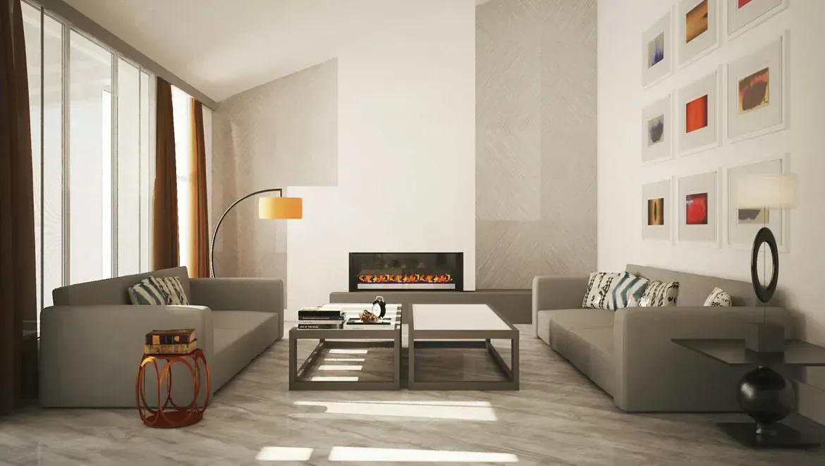 Una sala de estar con dos sofás y una chimenea.