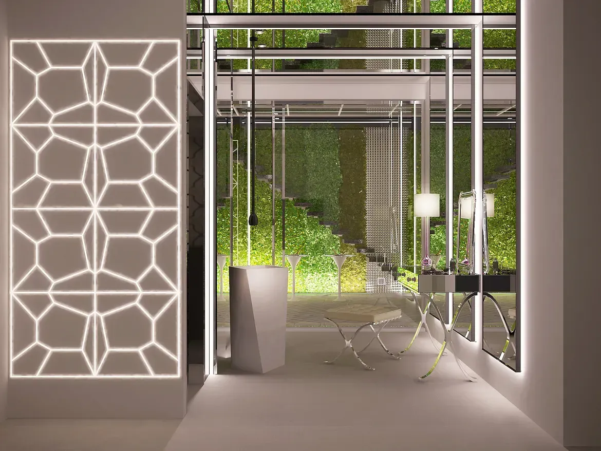 Una habitación con una ventana grande y un patrón geométrico en la pared.