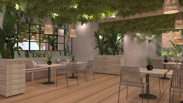 Un restaurante con mesas y sillas y plantas colgando del techo.