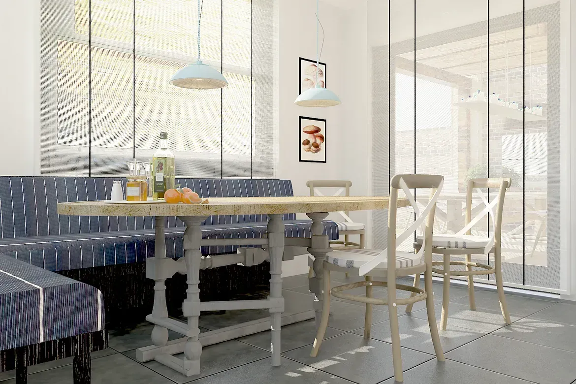 Un comedor con una mesa y sillas y un banco.