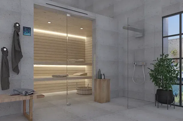Un baño con sauna y ducha a ras de suelo.