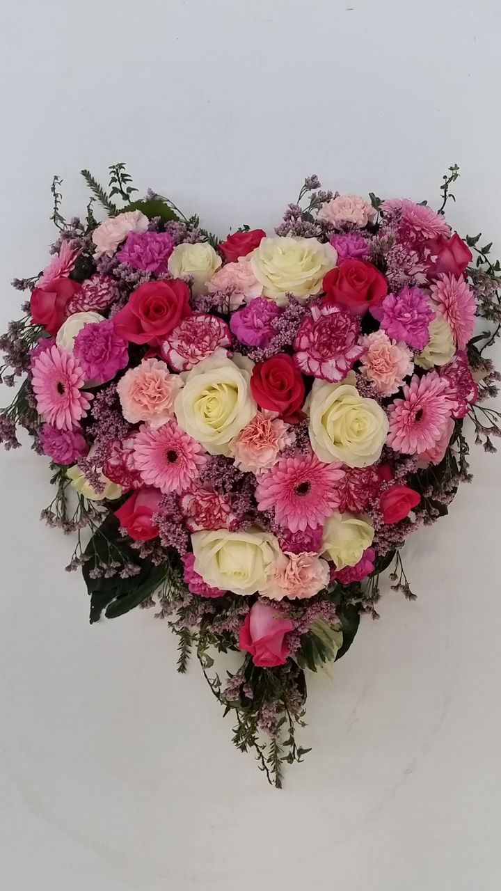 Herz aus Rosen pinkfarbene Blumen