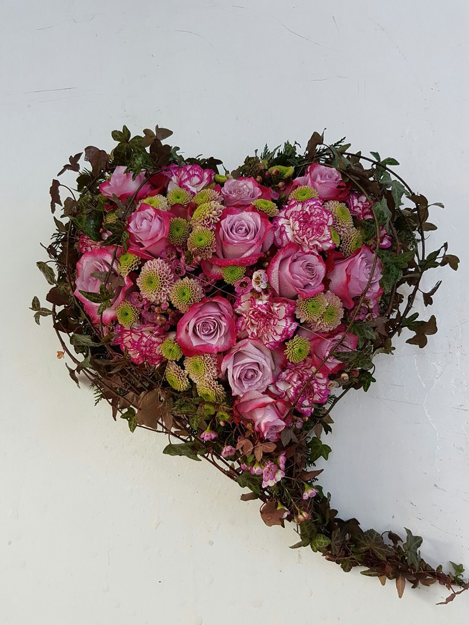 Herz aus Rosen pinkfarbene Blumen