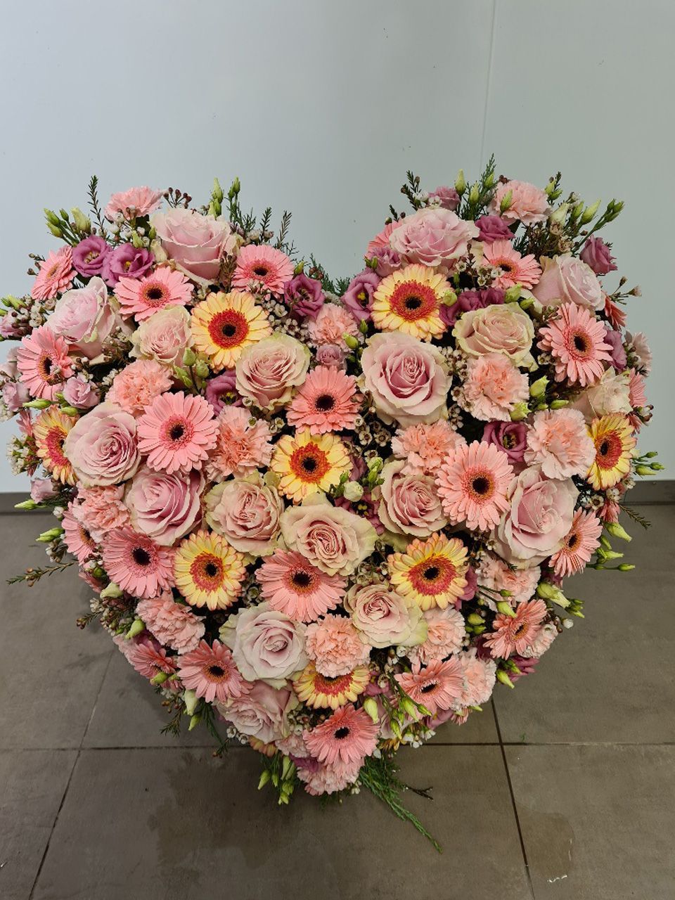 Herz aus Rosen pinkfarbene Blumen
