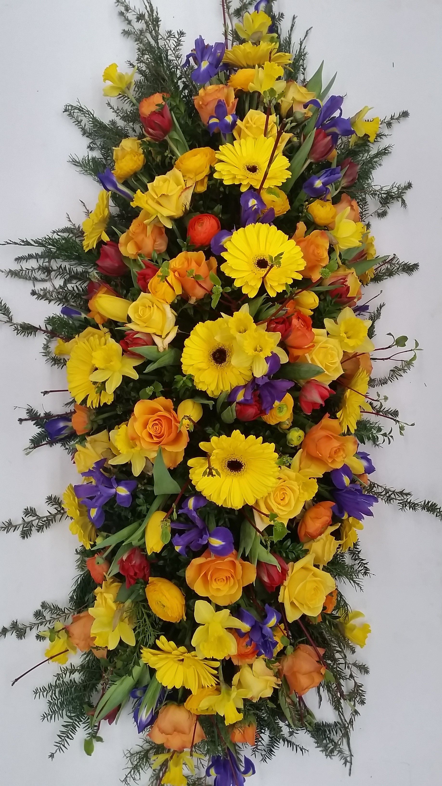 Sargbuketts mit gelben Blumen