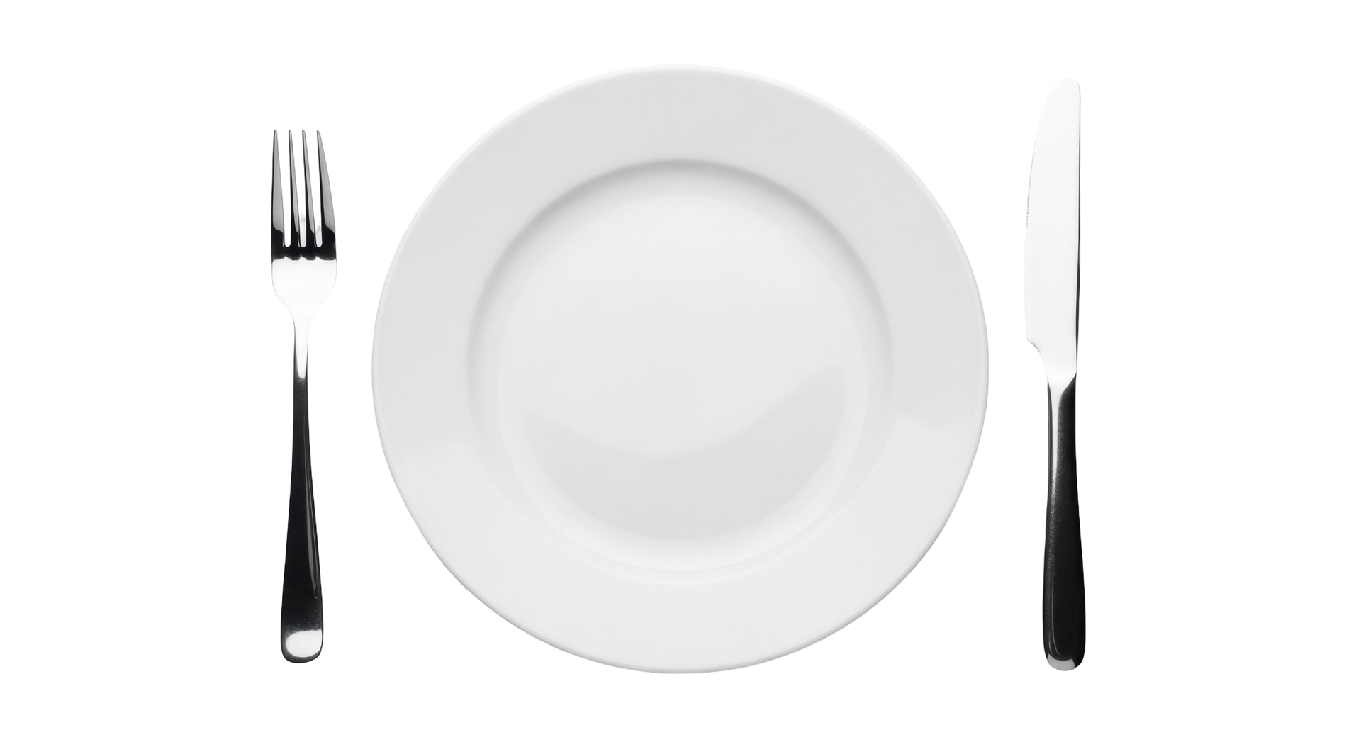 Assiette blanche entre une fourchette et un couteau.
