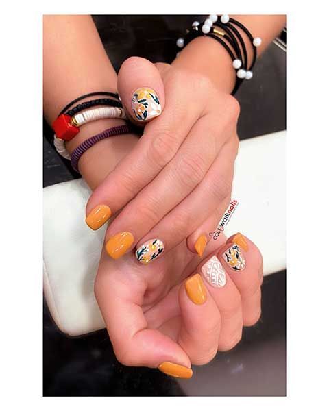 Μανικιούρ Πορτοκαλί με σχέδια 