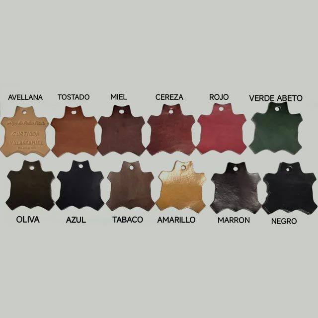 Leather color samples labeled avellana, tostado, miel, cereza, rojo, verde abeto, olivia, azul, tabaco, amarillo, marrón y negro