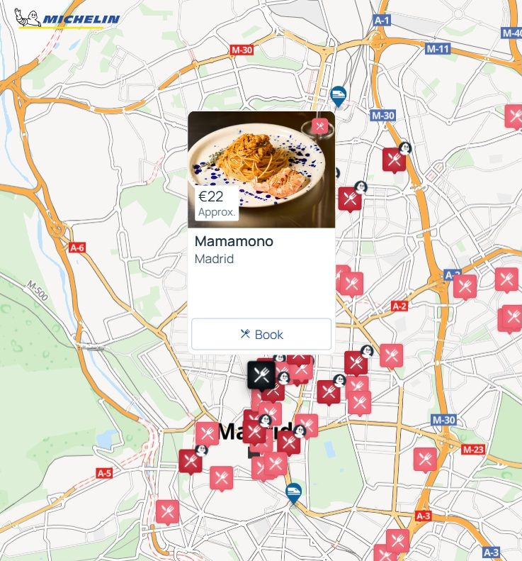 Mapa de Madrid con marcadores de restaurantes, uno seleccionado: 