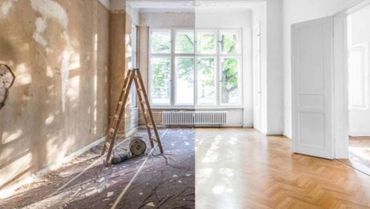 Person trägt Umzugskarton