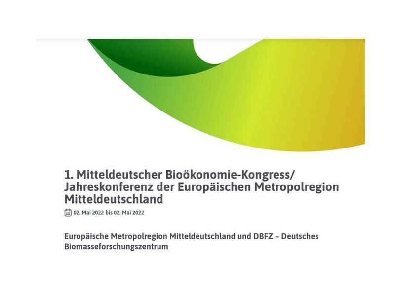 A green and yellow sign that says mitteldeutscher bioekonomie- kongress / jahreskonferenz der europäischen metroregion mitteldeutschland