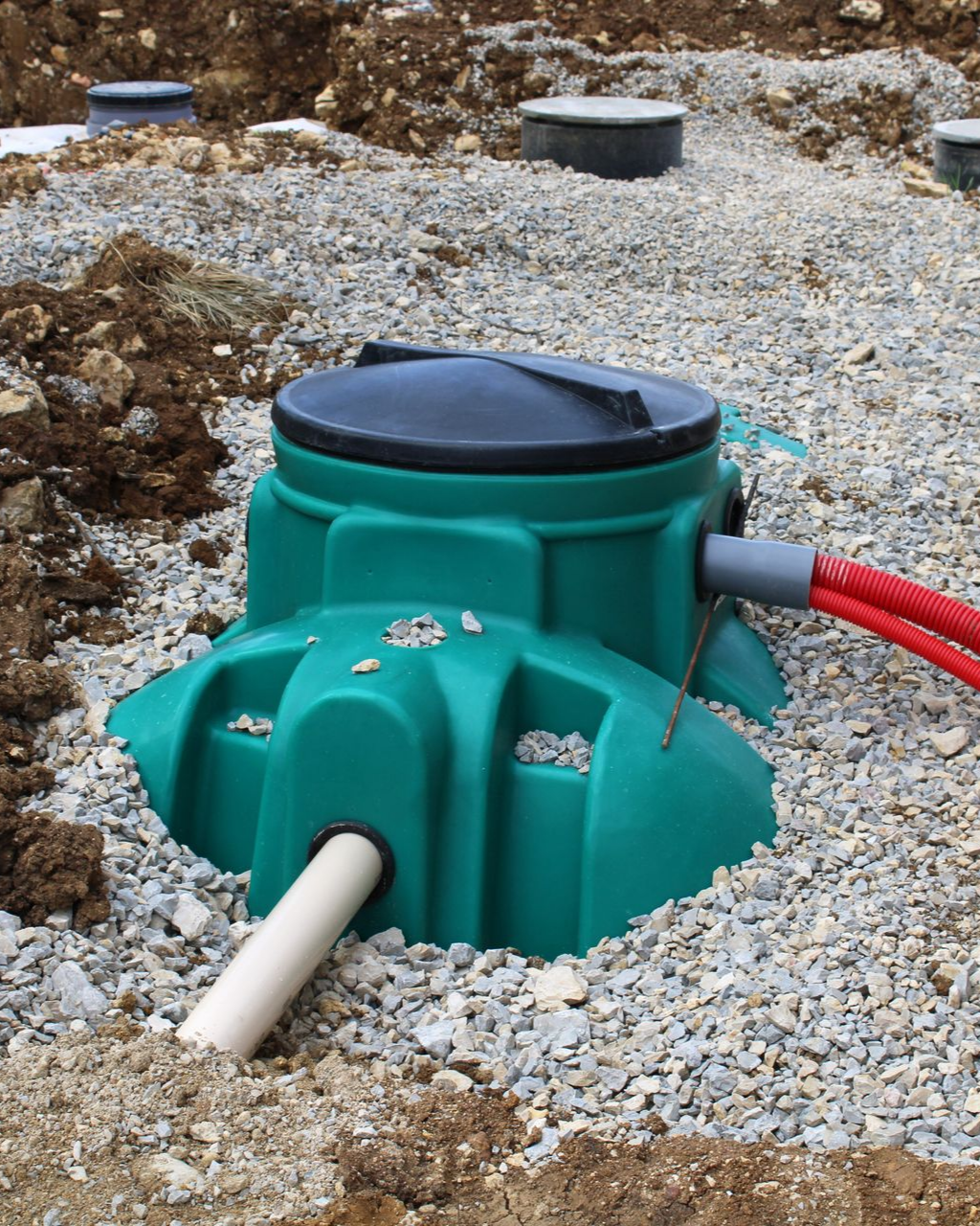 Assainissement individuel - cuve verte et bouchon noir