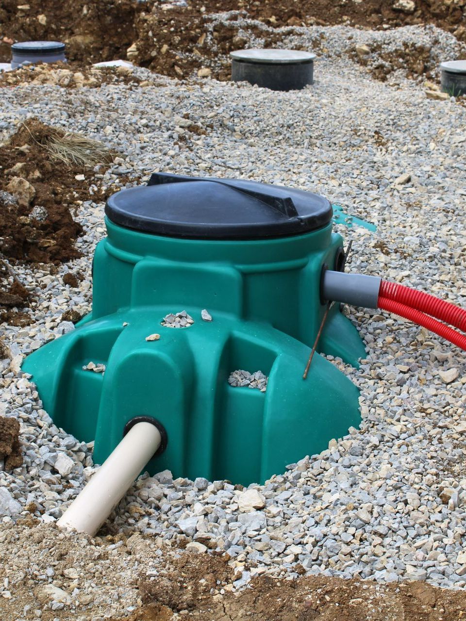 Assainissement individuel - cuve verte et bouchon noir
