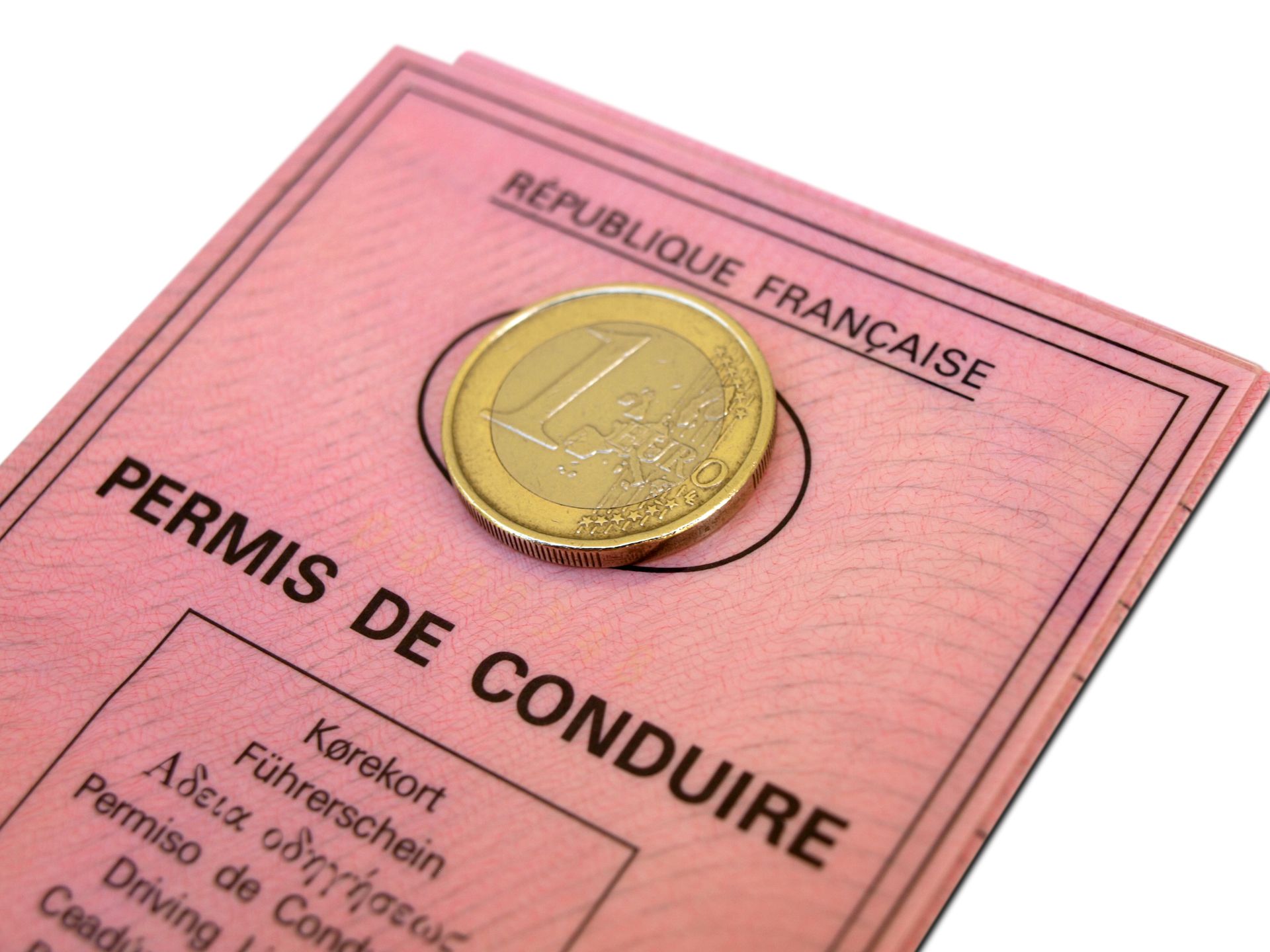 Permis de conduire et une pièce de 1 euro