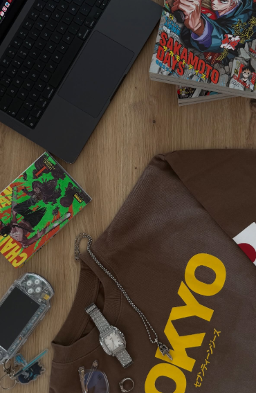 Portátil, manga, PSP, sudadera marrón con texto 