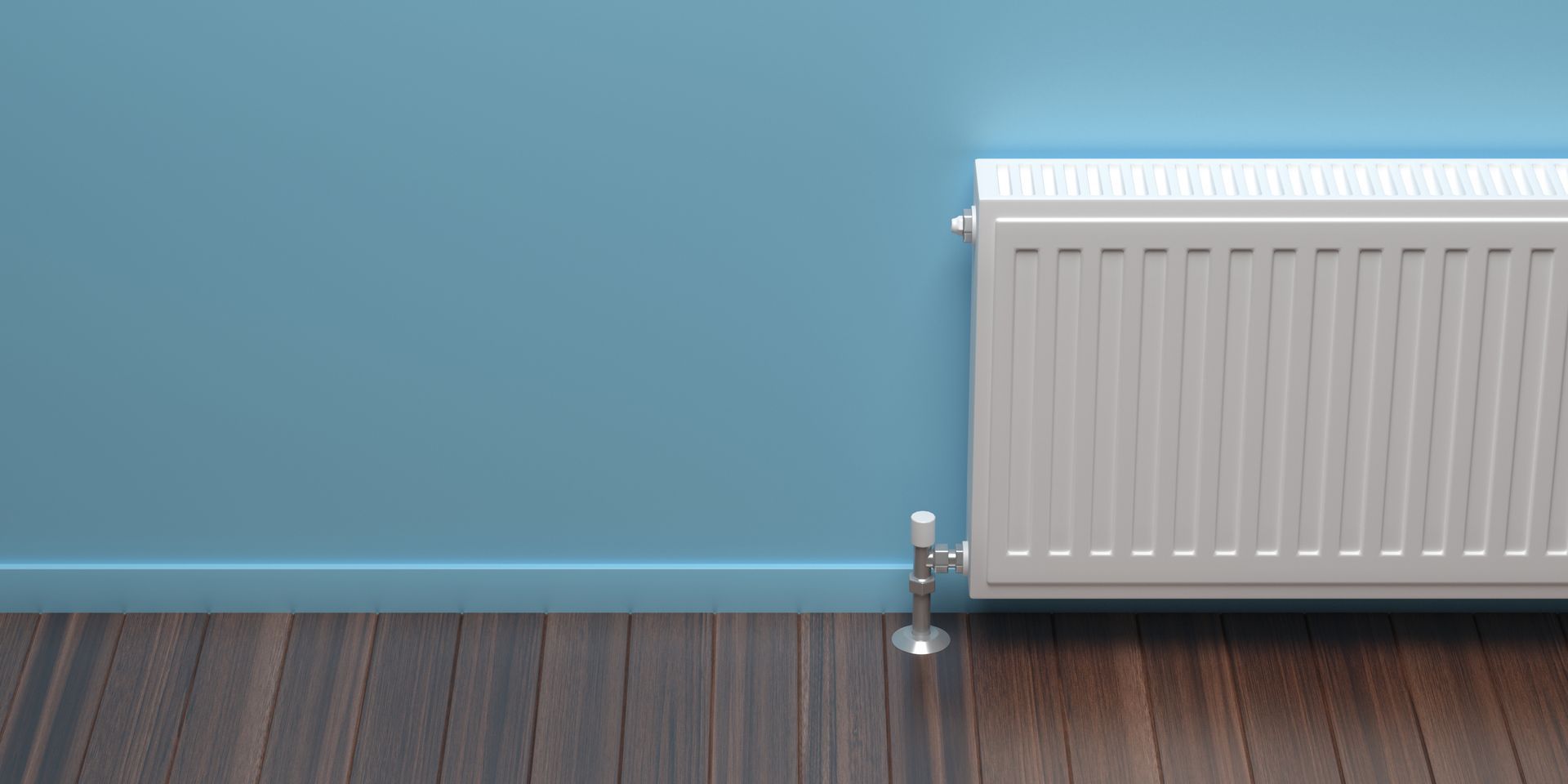 Radiateur électrique sur un mur bleu